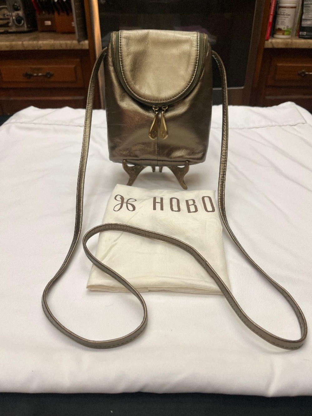 Like New HOBO Bronze Gold Fern Crossbody Bag.